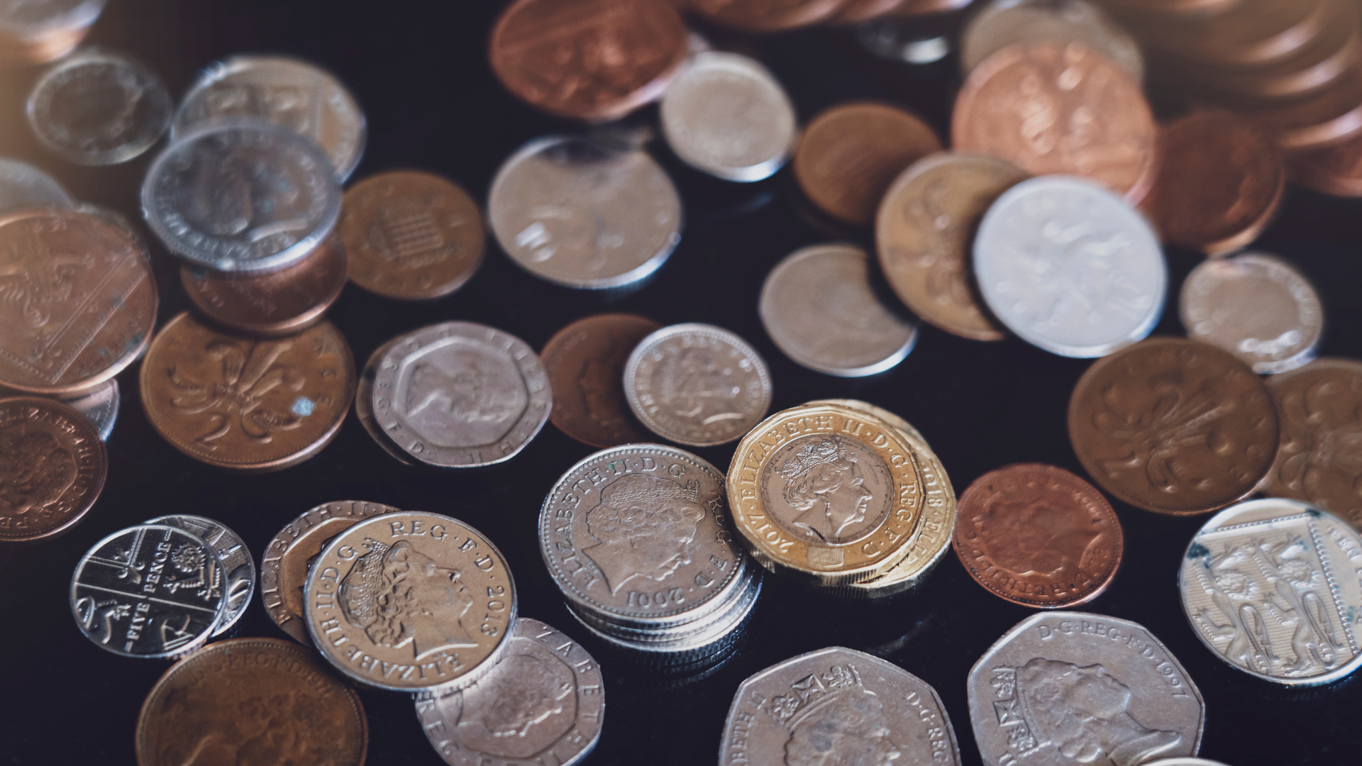 One Pound Sterling Coins and Pennies