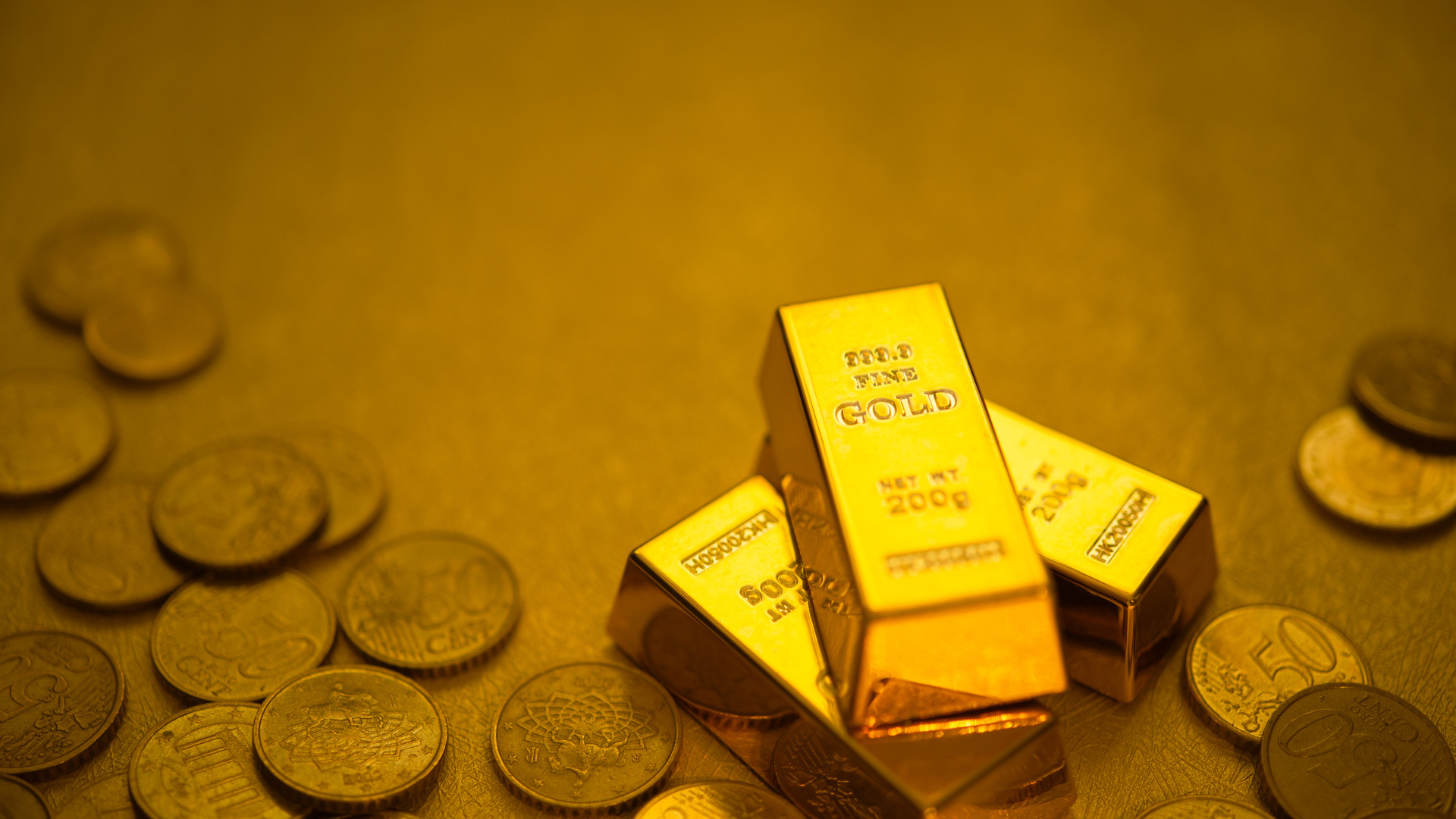 Gold Holds Four-Day Gain on Haven Demand and Dovish Fed Comments