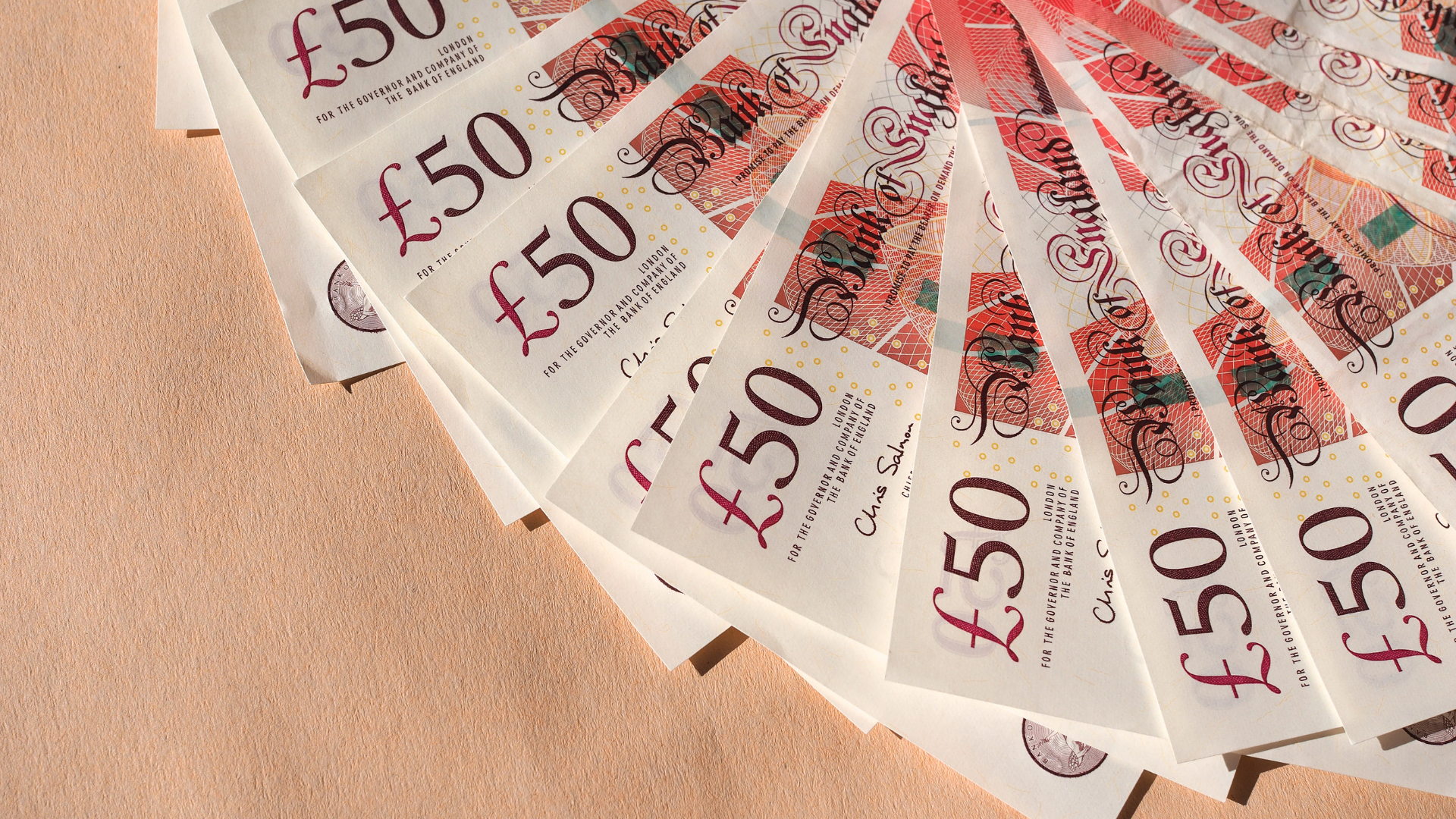 British pound climbs as dollar falters, but uncertainty lingers